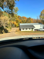 E's storage workshop building.