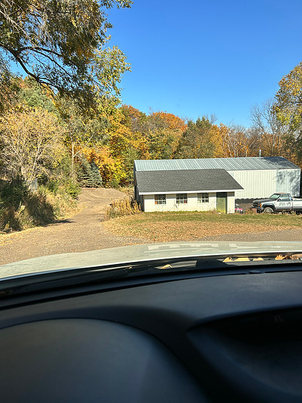 E's storage workshop building.