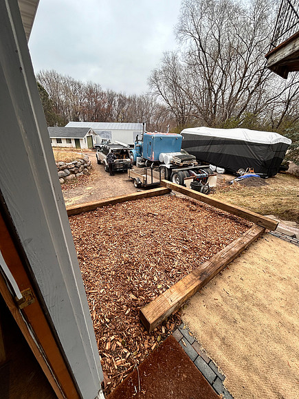 looking out front door to parking and potty yard