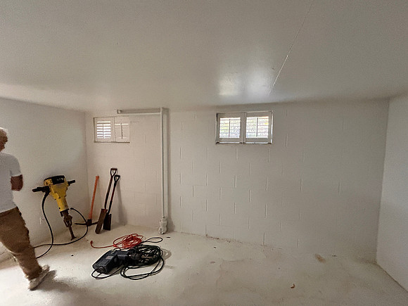 front of the bedroom where bathroom will go along the wall
