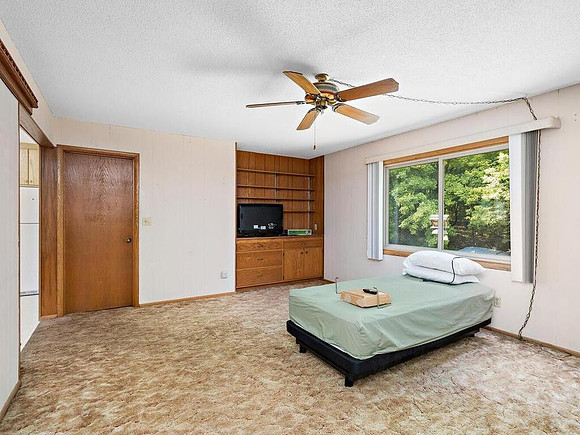 This giant room is now laundry, my office and full bathroom