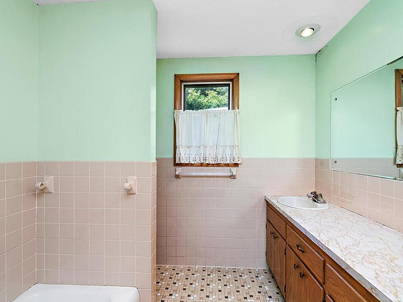 upstair bath. New vanity and large soaking tub/shower waiting for installation
