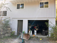our garage and the window on the left is living room window