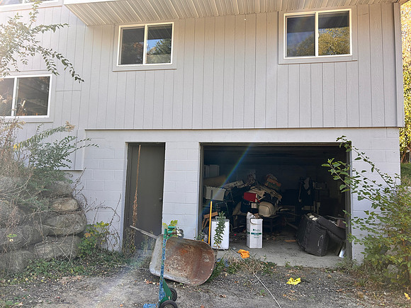 our garage and the window on the left is living room window