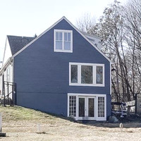 new north side. Main floor window is the new kitchen. Third floor window is old nurseery